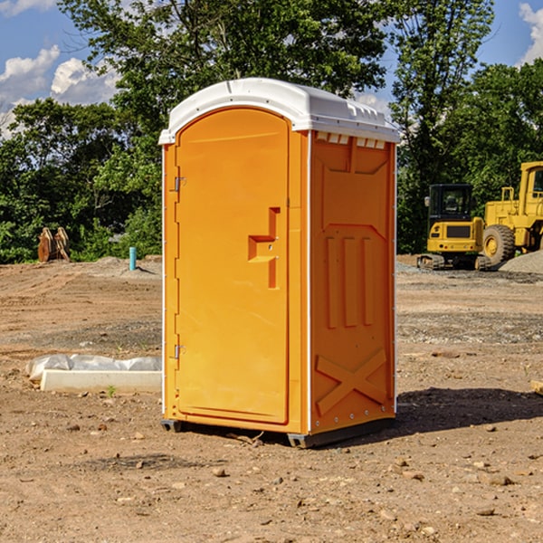 how often are the porta potties cleaned and serviced during a rental period in Roann